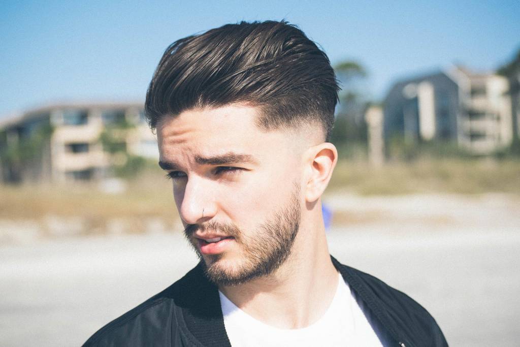 male-with-light-brown-hair-&-features-short-faded-with-slick-back-hair