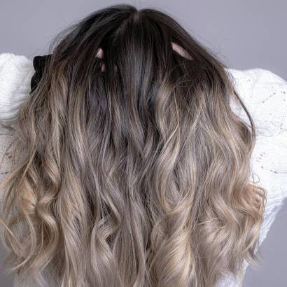woman-professional-hair-blonde-happy-fresh-color-curled-hair